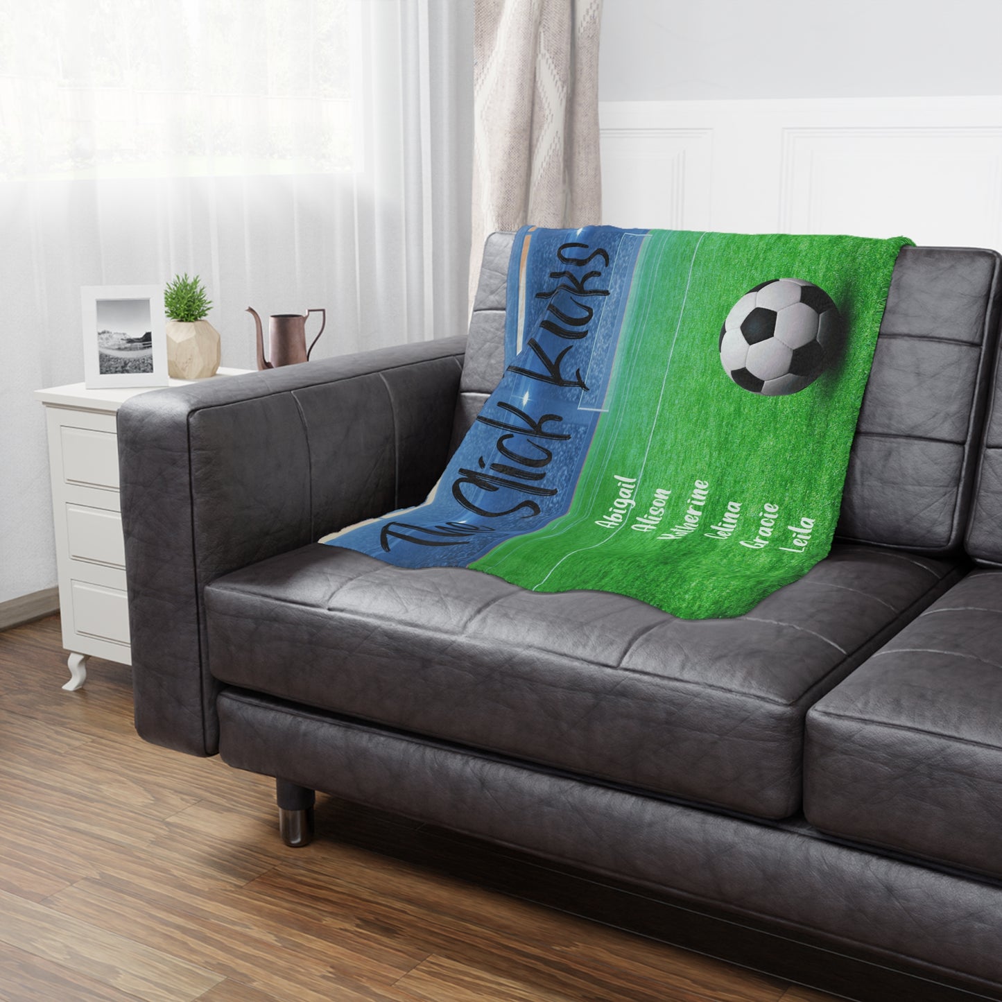 soccer team banner blanket hangin Ninja soccer team banner blanket hanging on side of brown leather couchg on side of brown leather couch